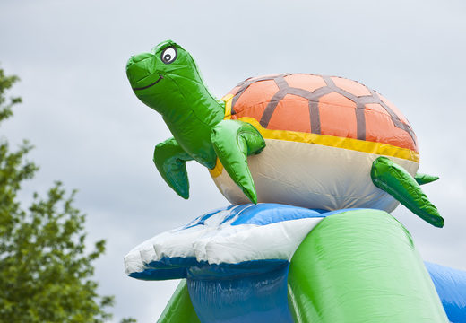 Acquistare un multigioco gonfiabile per bambini con tetto ostacoli e scivolo con il tema tartaruga