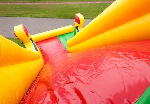 clownslide super opblaasbaar springkussen kopen in thema clown met glij en klimmat voor kinderen