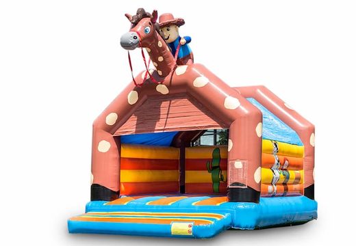 Grande castello gonfiabile con tetto a tema cowboy da acquistare per i bambini. Disponibile su JB Gonfiabili Italia online