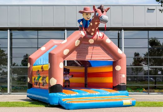 Castello gonfiabile super a tema cowboy con tetto per bambini. Acquista castelli gonfiabili online su JB Gonfiabili Italia