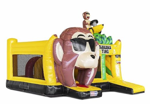 Ordina un castello gonfiabile con ostacoli e uno scivolo a tema scimmia banana